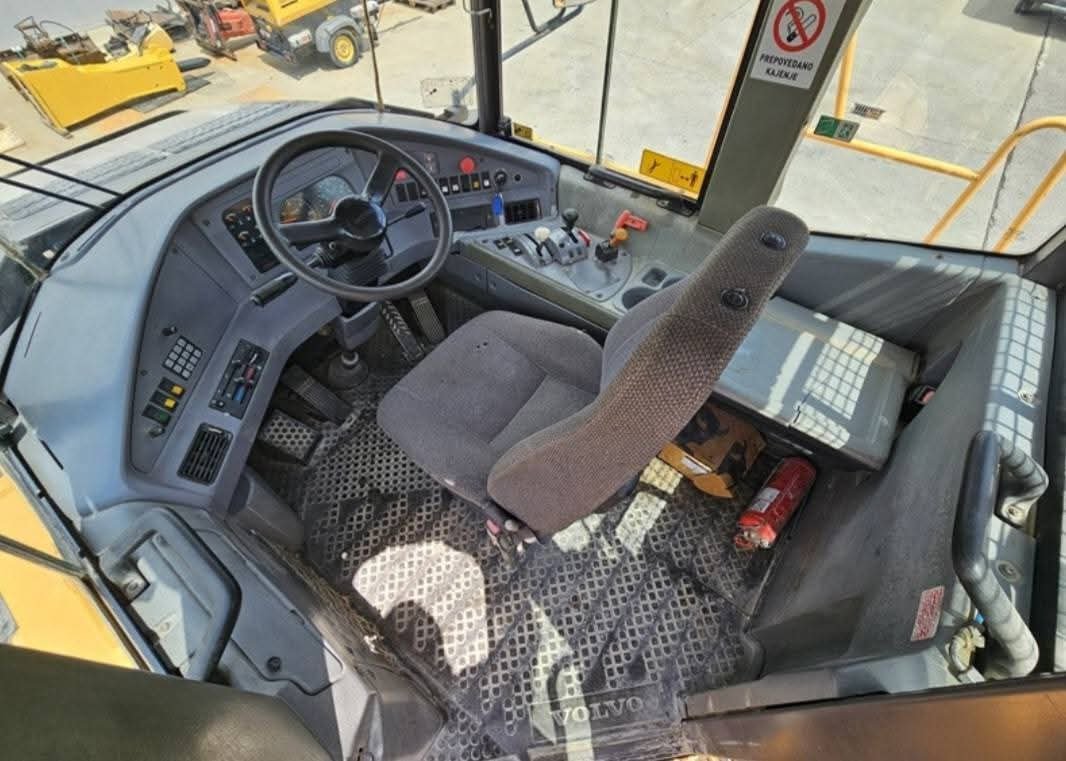 Dump truck for sale in Syria, Volvo A35D 1990 model, located in Aleppo, the best site for selling trucks and heavy equipment in Syria.