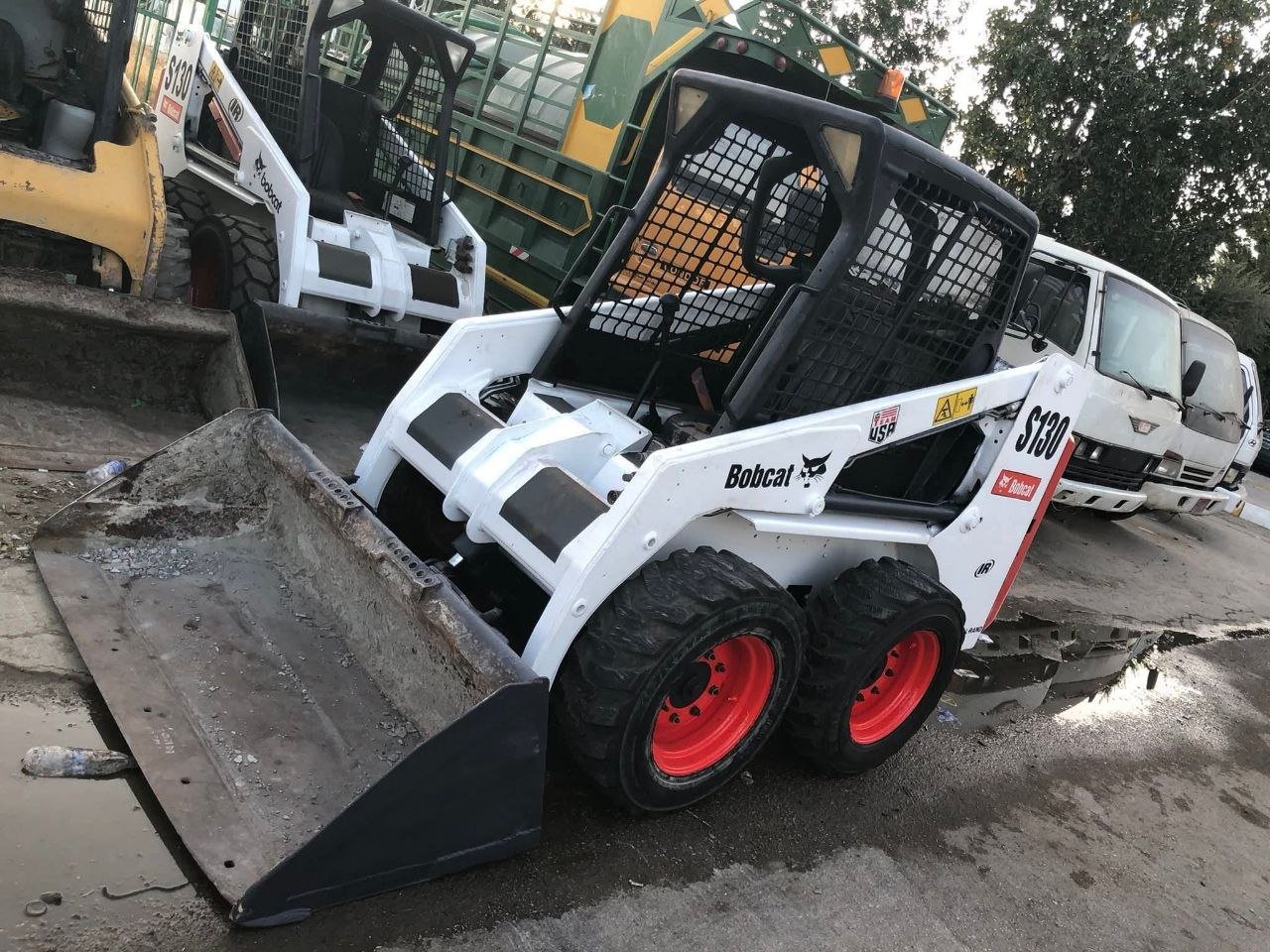 Bobcats for sale in Syria, Bobcat S130 model 2004 exported from Lebanon to Syria, the best site for selling trucks and heavy equipment in Syria.