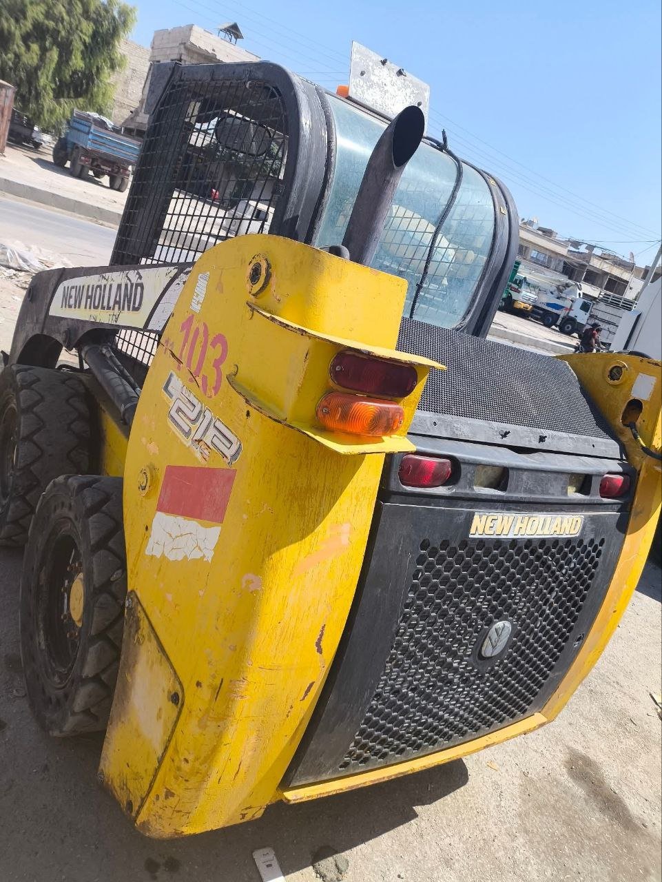 Bobcats in Syria, New Holland 103 model 2015 located in Idlib, the best site for selling trucks and heavy equipment in Syria.