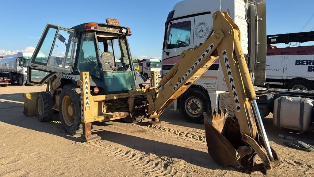 JCB loader for sale in Idlib, JCB 410 model 2000, located in Idlib, the best site for selling trucks and heavy equipment in Syria
