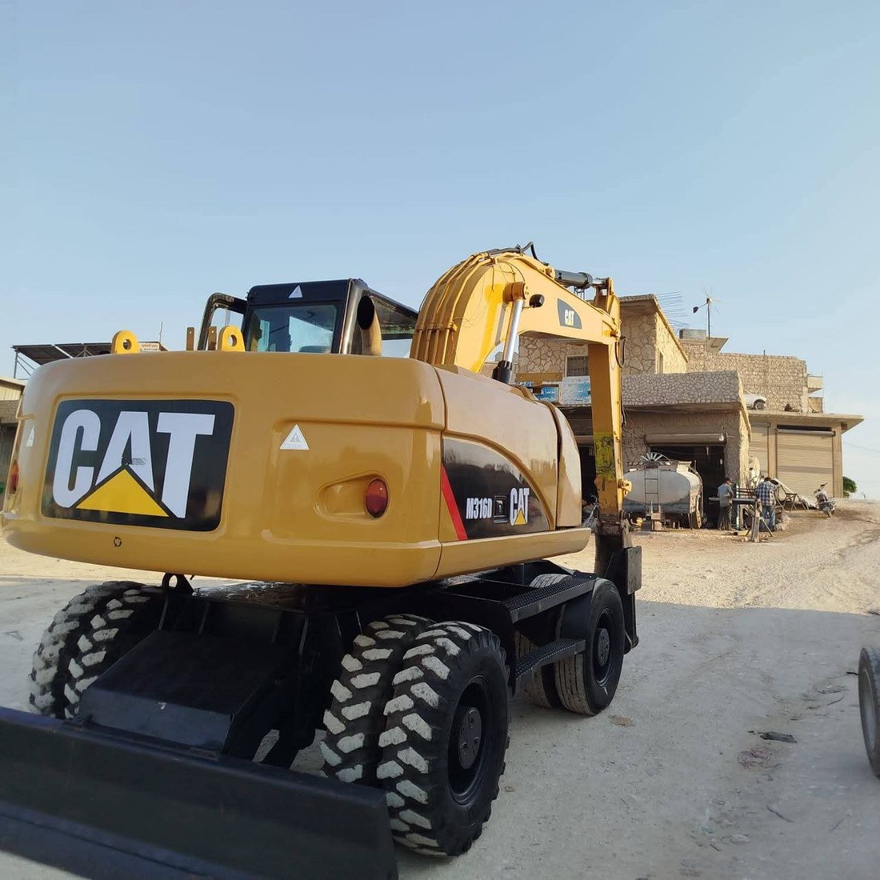 CAT excavator for sale in Aleppo, CAT 316 model 2011 located in Aleppo, the best site for selling trucks and heavy equipment in Syria